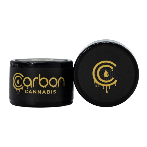 Two Carbon branded black jars. One upright and the other showing the top next to it.